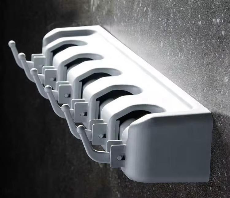 SOPORTE PARA  ESCOBAS MULTIFUNCIONAL